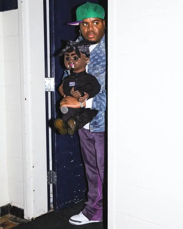 Duke Deuce outfit in Balenciaga, Mnml, and New Era, 2022