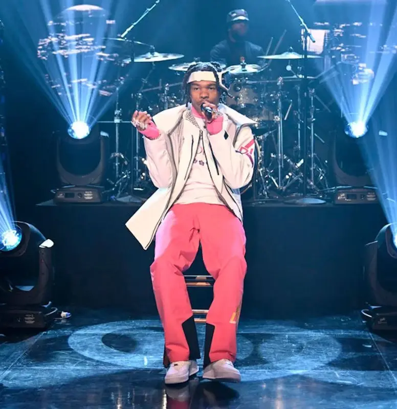 Lil Baby outfit in Dior, Nike, and Descente, 2022