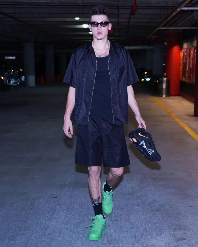 Tyler Herro outfit in Prada, Celine, and Nike, 2022