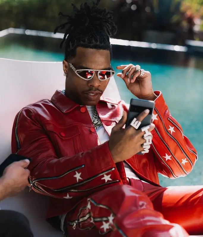 Lil Baby outfit in Cease±Desist, Nike, and Versace, 2022