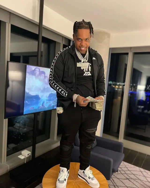 Finesse2tymes outfit in Kappa, Amiri, and Jordan, 2022