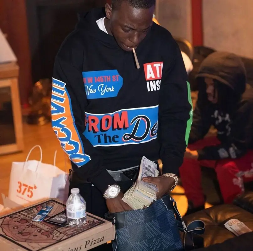 Bobby Shmurda outfit in Amiri, Jordan, and Prada, 2022