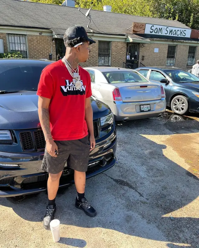 Big Scarr outfit in Louis Vuitton, Supreme, and Amiri, 2022