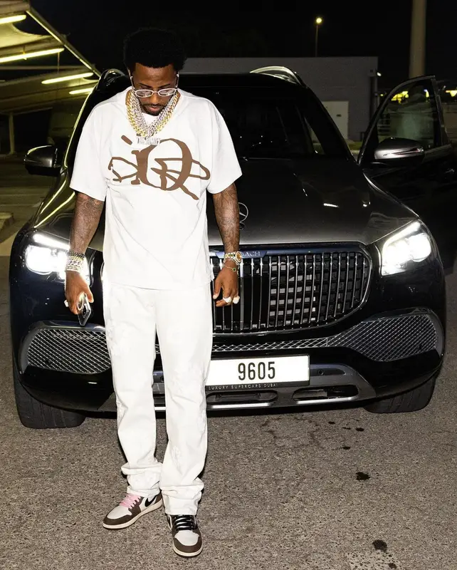 Fabolous outfit in Dior, Denim Tears, and Travis Scott Merch, 2022