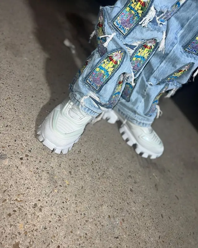 Sauce Walka outfit in Off-White, Who Decides War, and Prada, 2022