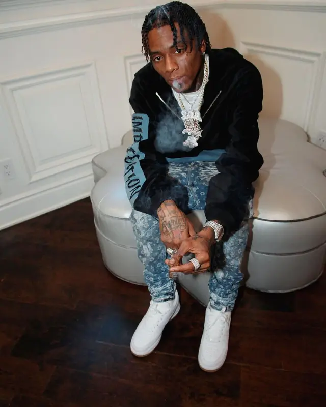Soulja Boy outfit in Purple Brand, Nike, and Burberry, 2022