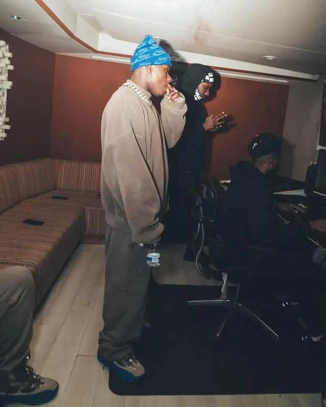 DaBaby outfit in Yeezy, Supreme, and Nike, 2022