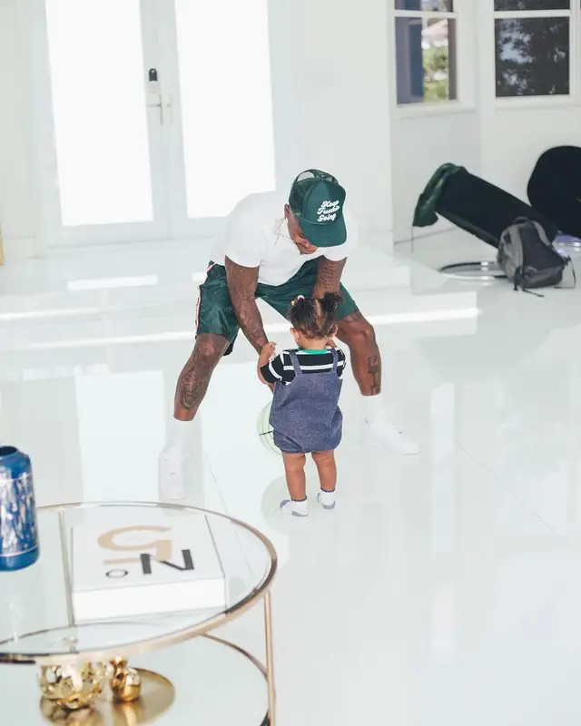 DaBaby outfit in Hanes, Nike, and Gucci, 2022