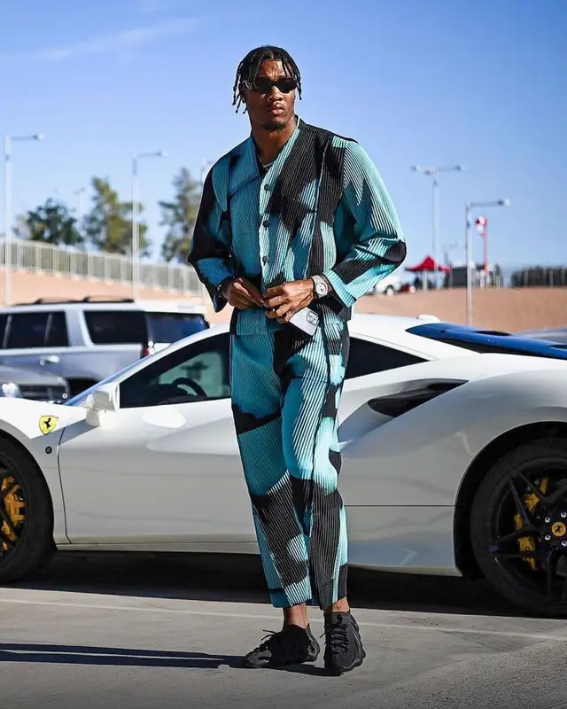 Isaiah Simmons outfit in Issey Miyake, Adidas, and Yeezy, 2022