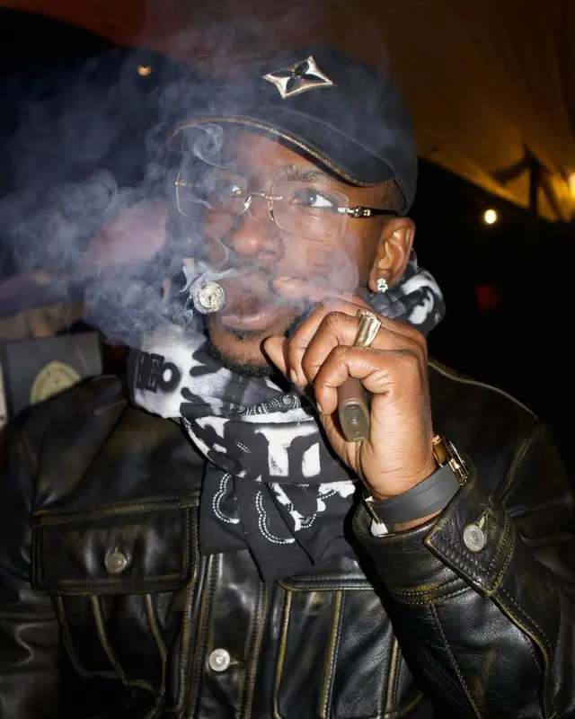 Skepta outfit in Cartier, Louis Vuitton, and Givenchy, 2022