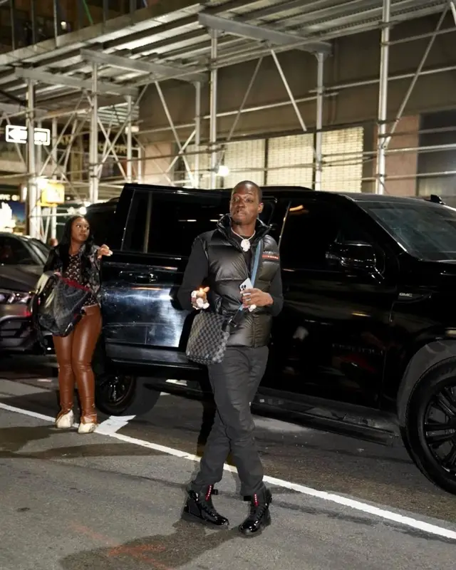 Bobby Shmurda outfit in Prada and Louis Vuitton, 2022