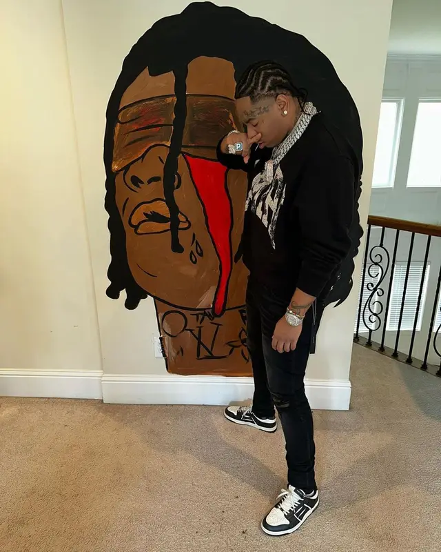 Lil Gotit outfit in Amiri, 2022