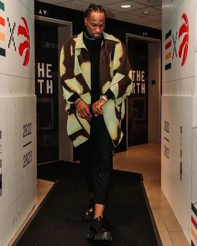 Precious Achiuwa outfit in Issey Miyake, Tom Ford, and Prada, 2022