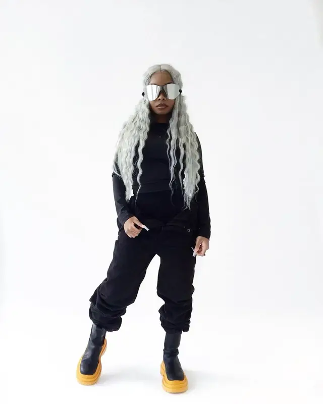 Lola Brooke outfit in Bottega Veneta, Yeezy, and GAP, 2022