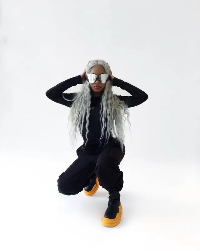 Lola Brooke outfit in Bottega Veneta, Yeezy, and GAP, 2022