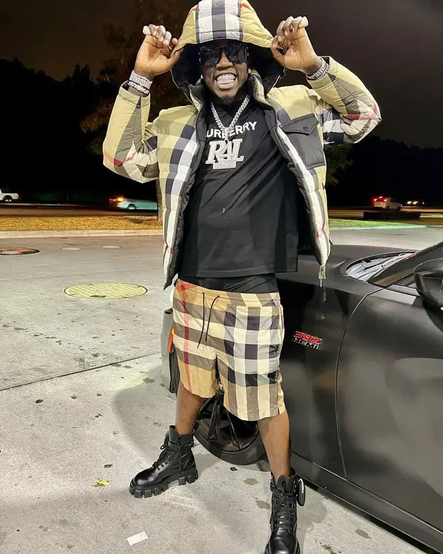 Big Boogie outfit in Prada and Burberry, 2022