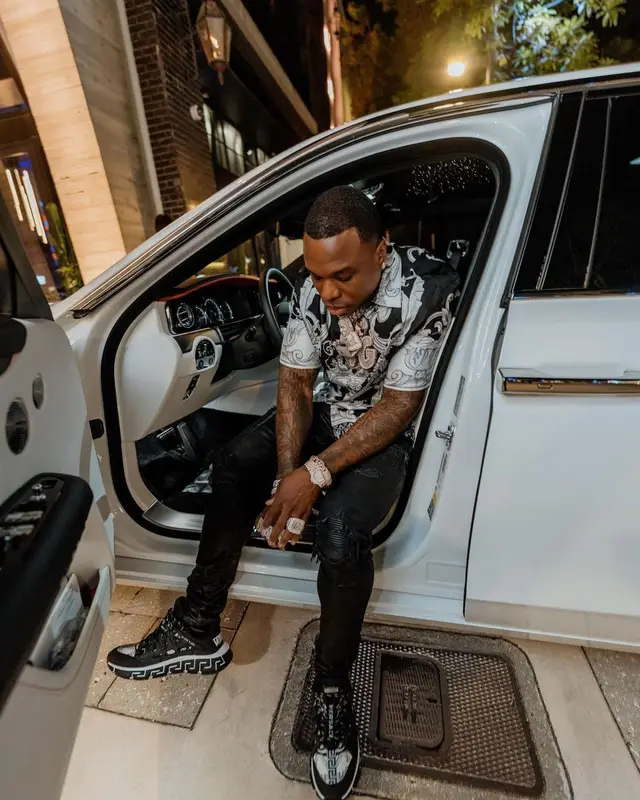 BandMan Kevo outfit in Versace and Amiri, 2022