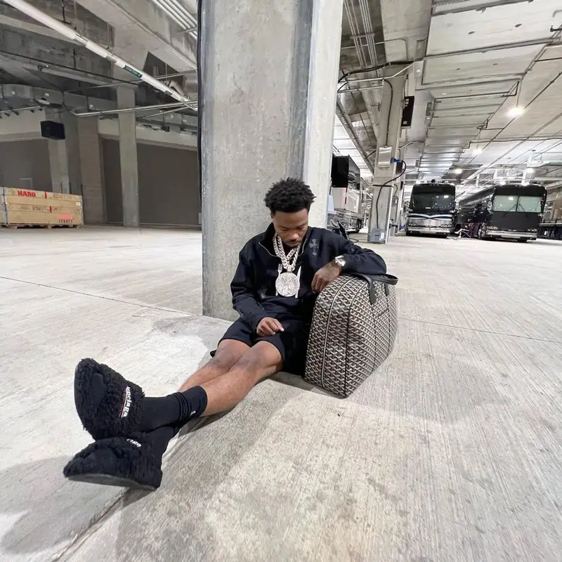 Roddy Ricch outfit in Chrome Hearts, Goyard, and Balenciaga, 2022
