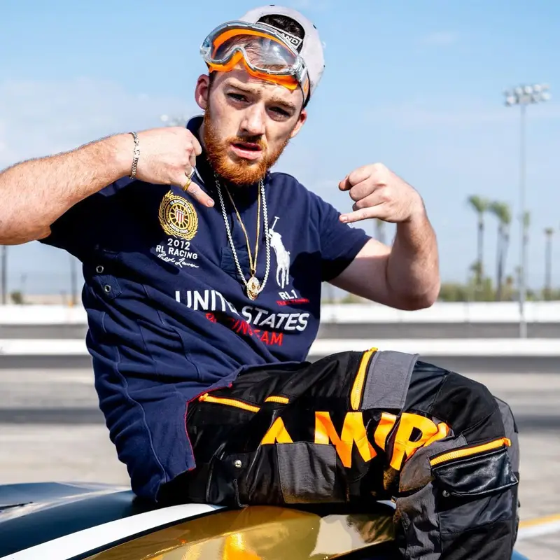 Angus Cloud outfit in Polo Ralph Lauren, Amiri, and Adidas, 2022