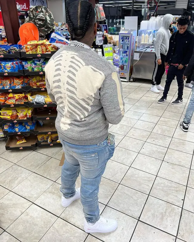 Finesse2tymes outfit in Kapital, Amiri, and Gucci, 2022