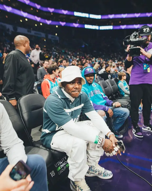 DaBaby outfit in Amiri, Nike, and Louis Vuitton, 2022