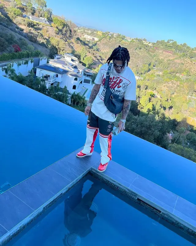 No Cap outfit in Hellstar, Gallery Dept., and Burberry, 2022