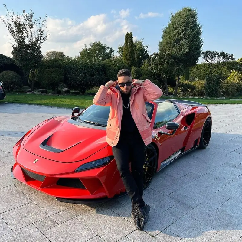 Azet outfit in Stone Island and Prada, 2022