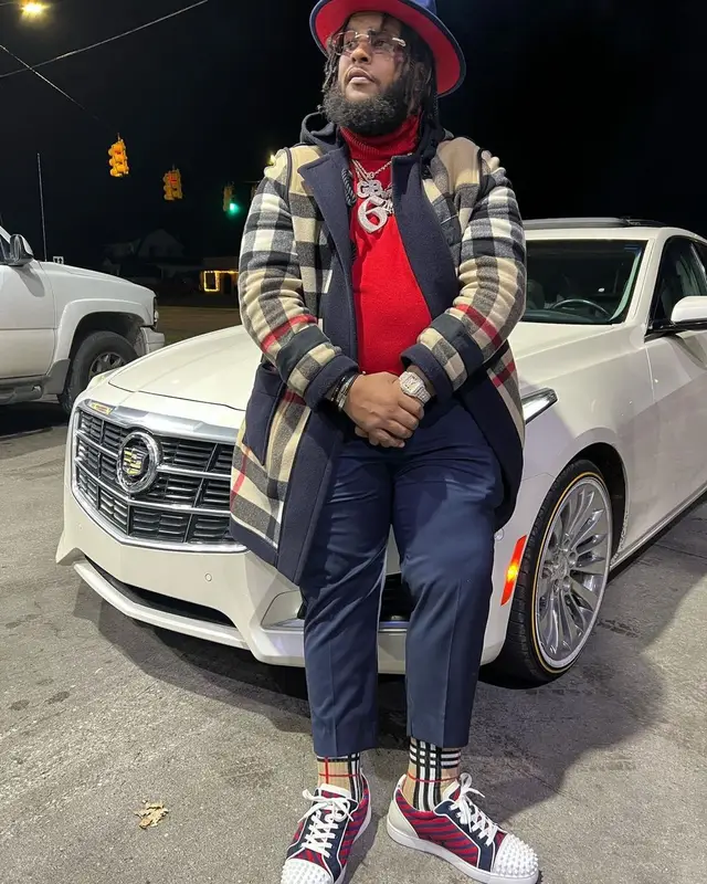 RMC Mike outfit in Christian Louboutin, Cartier, and Burberry, 2022