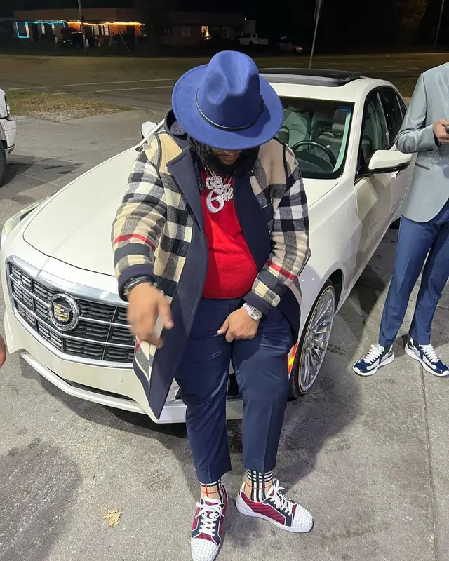 RMC Mike outfit in Christian Louboutin, Cartier, and Burberry, 2022