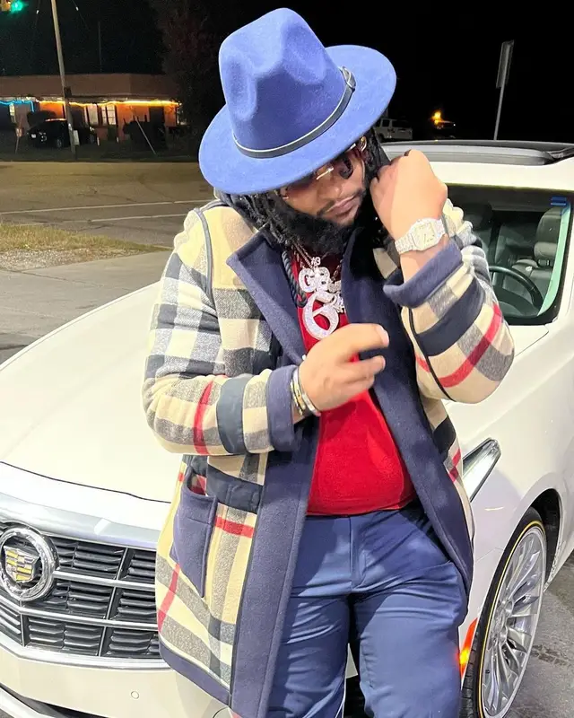 RMC Mike outfit in Christian Louboutin, Cartier, and Burberry, 2022