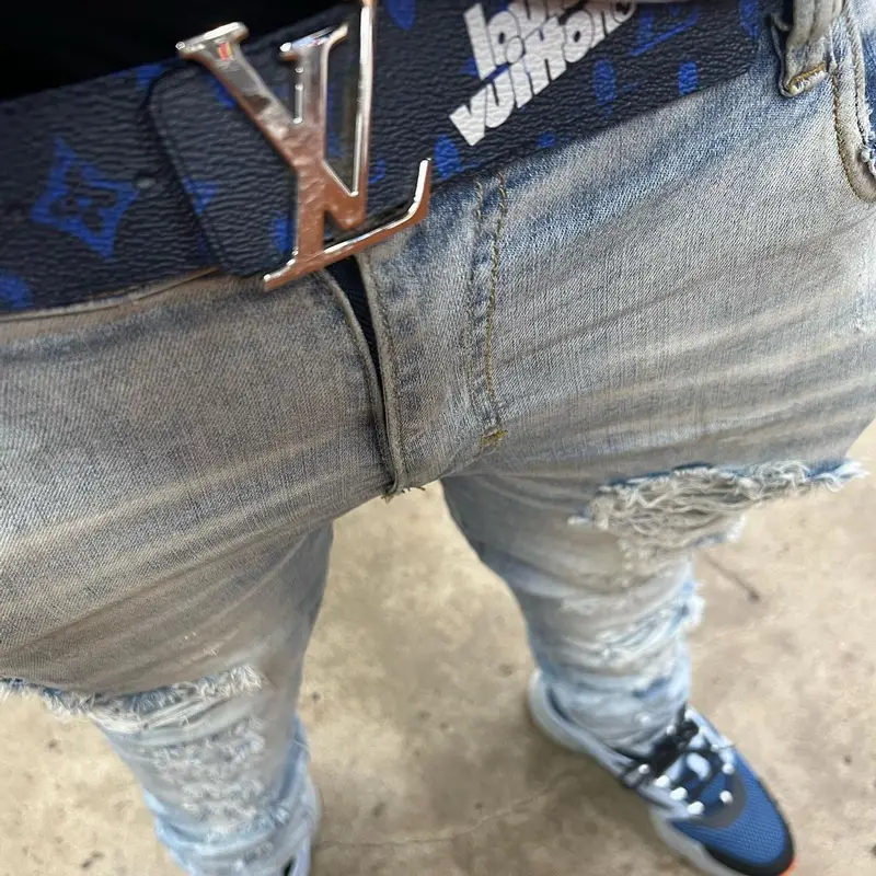 RMC Mike outfit in Dior, Louis Vuitton, and Amiri, 2022