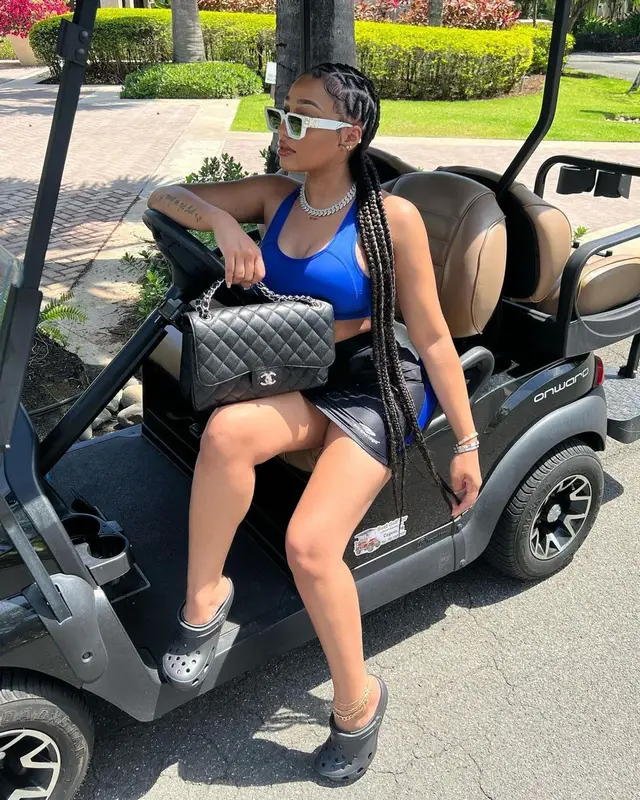 Ella Bands outfit in Chanel, Louis Vuitton, and Balenciaga, 2022
