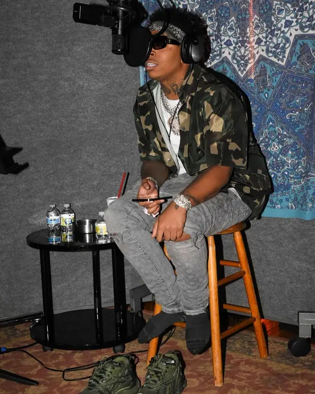 Lil Gotit outfit in Heron Preston, Purple Brand, and Celine, 2022
