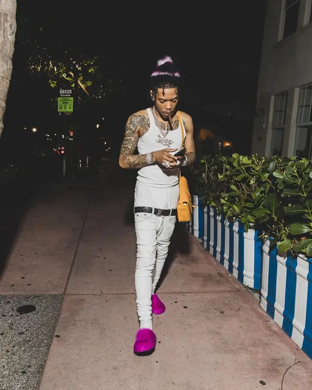 Lil Migo outfit in Louis Vuitton, Goyard, and Marni, 2022