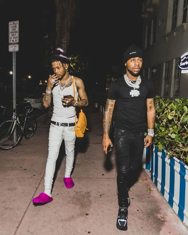 Lil Migo outfit in Louis Vuitton, Goyard, and Marni, 2022