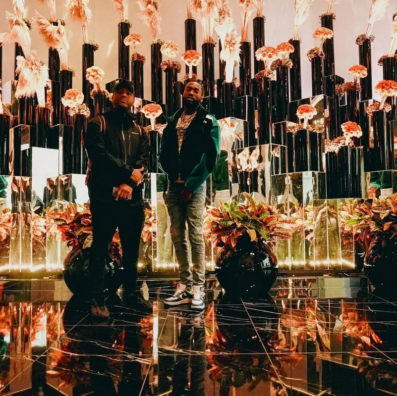 Meek Mill outfit in Louis Vuitton, Amiri, and Nike, 2022