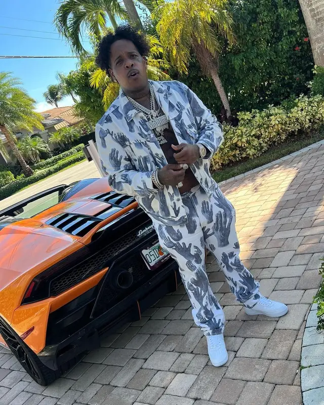 Finesse2tymes outfit in Denim Tears and Nike, 2022