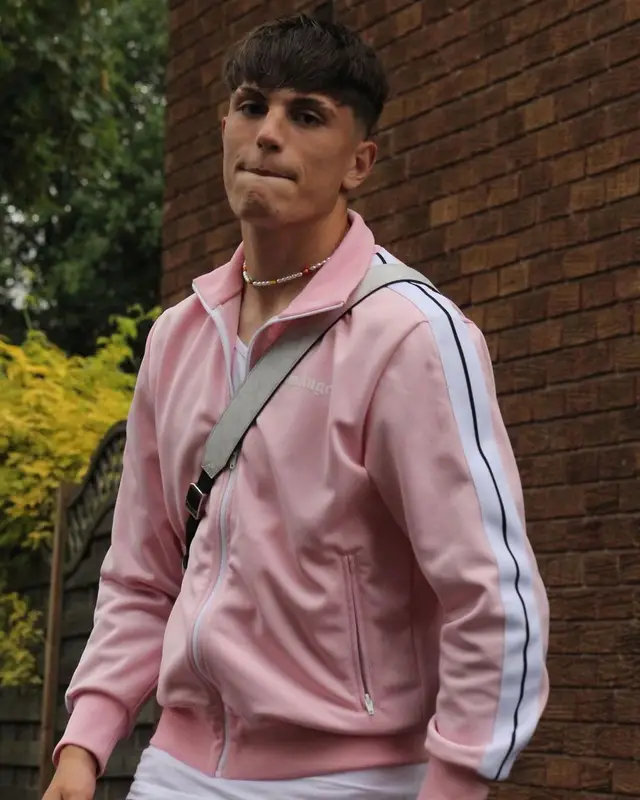 Alejandro Garnacho outfit in Palm Angels, J Balvin Merch, and Louis Vuitton, 2022