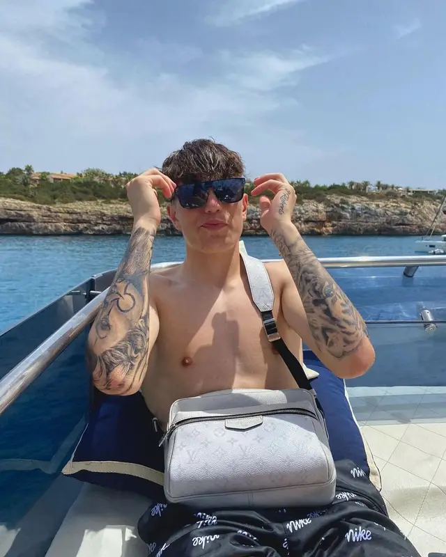 Alejandro Garnacho outfit in Nike and Louis Vuitton, 2022