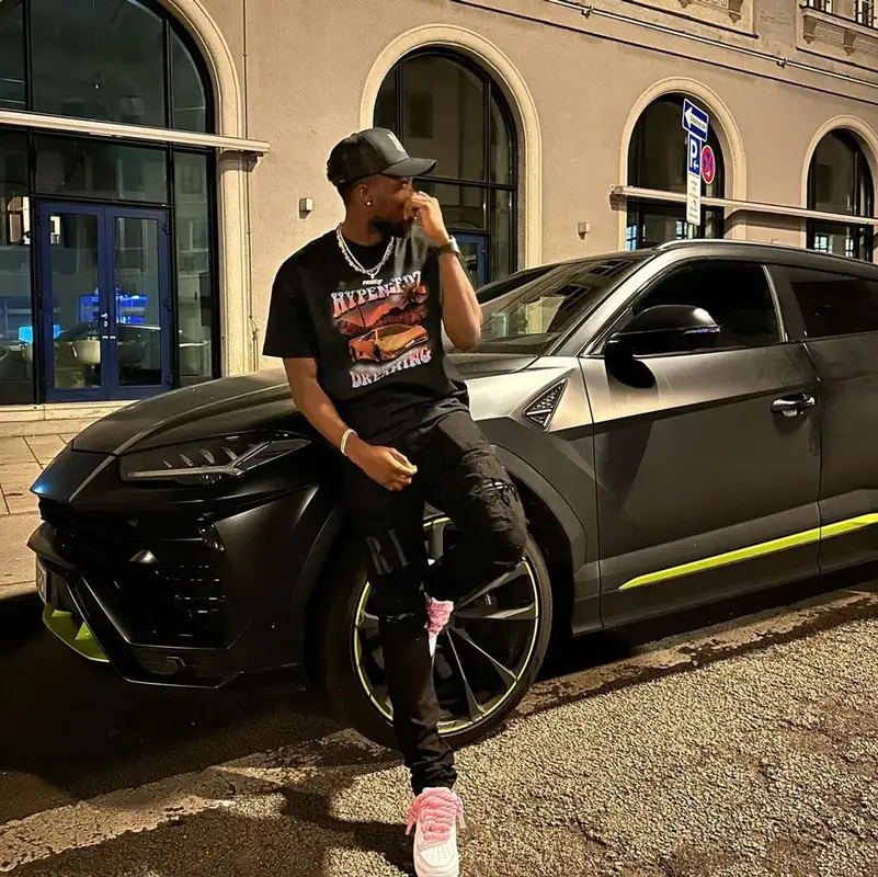 Alphonso Davies outfit in Hypeneedz, Nike, and Amiri, 2022