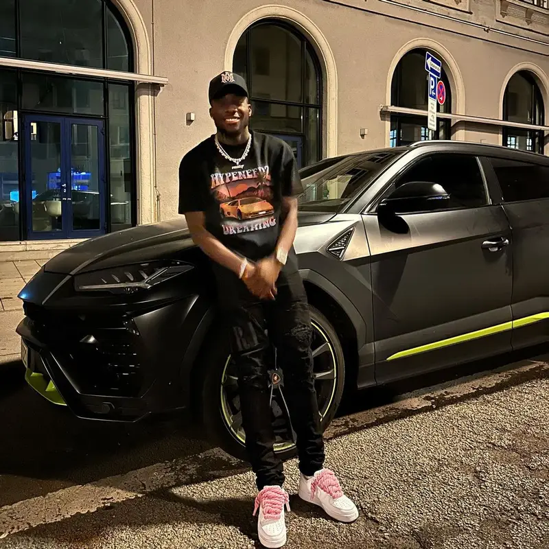 Alphonso Davies outfit in Hypeneedz, Nike, and Amiri, 2022