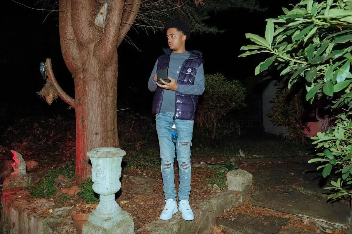 Loski outfit in Moncler, Gallery Dept., and Amiri, 2022