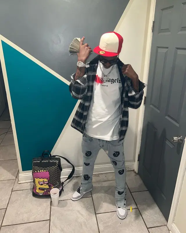 Lil Double 0 outfit in Supreme, Fear of God, and New Era, 2022