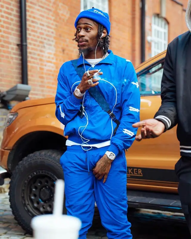Russ Millions outfit in Jordan, Louis Vuitton, and Trapstar, 2022