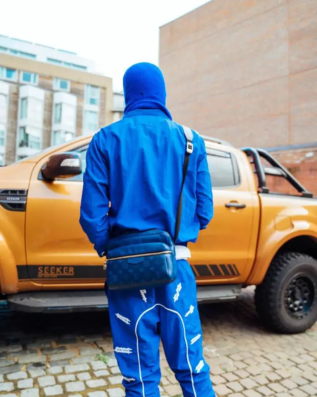 Russ Millions outfit in Jordan, Louis Vuitton, and Trapstar, 2022