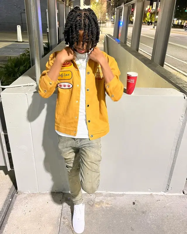 Lil Darius outfit in The Aware Brand, Purple Brand, and Nike, 2022