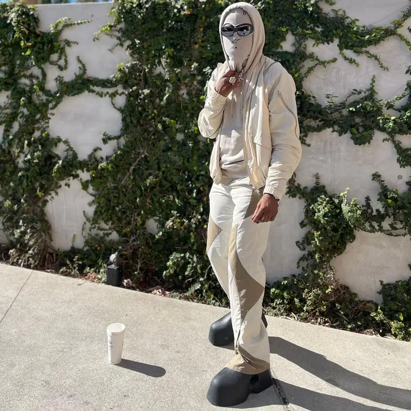 Rich The Kid outfit in Heliot Emil, Scry Lab, and Alpinestars, 2022