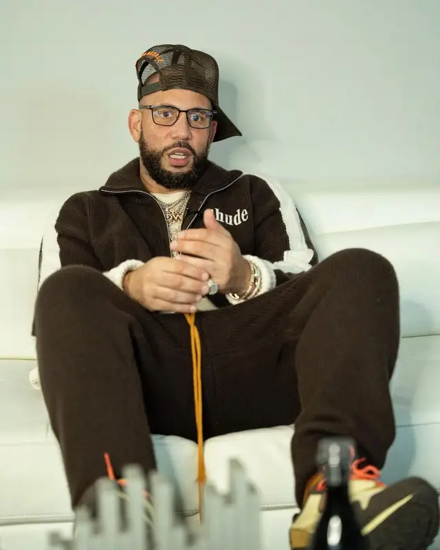 DJ Drama outfit in Rhude, Nike, and Travis Scott Merch, 2022
