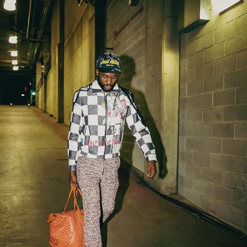 Meek Mill outfit in Amiri, Bottega Veneta, and Louis Vuitton, 2022