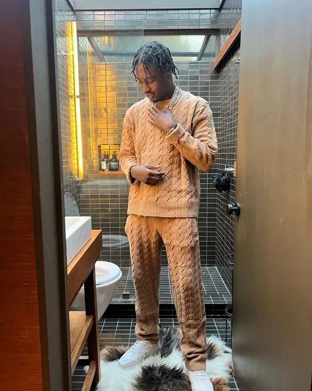 Lil Tjay outfit in Laneus and Raf Simons, 2022